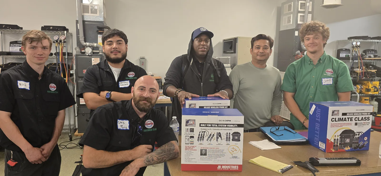 Technicians and their measureQuick probe kits at the July 2026 commissioning training, hands-on at Johnstone Supply in Denver.