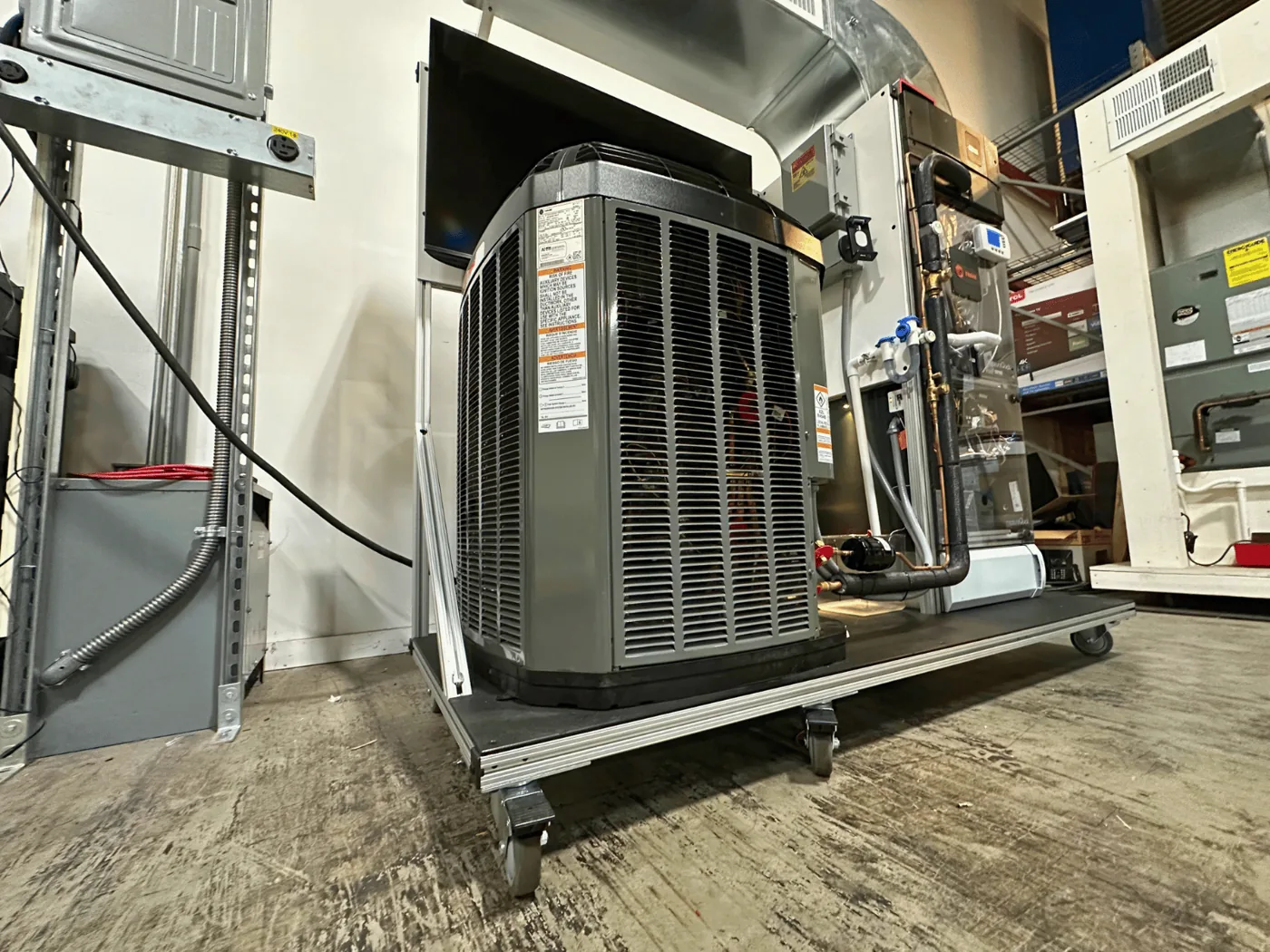 The condenser on the mobile aluminum frame with six locking casters, ready to roll through a standard doorway